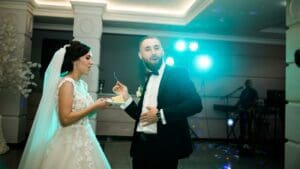 fedora-dj-wedding-bride-groom-dancefloor-eating-cake-band-mc