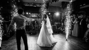 fedora-djs-wedding-bride-groom-brdial-waltz-dancefloor-fireworks-wedding-guests-veil
